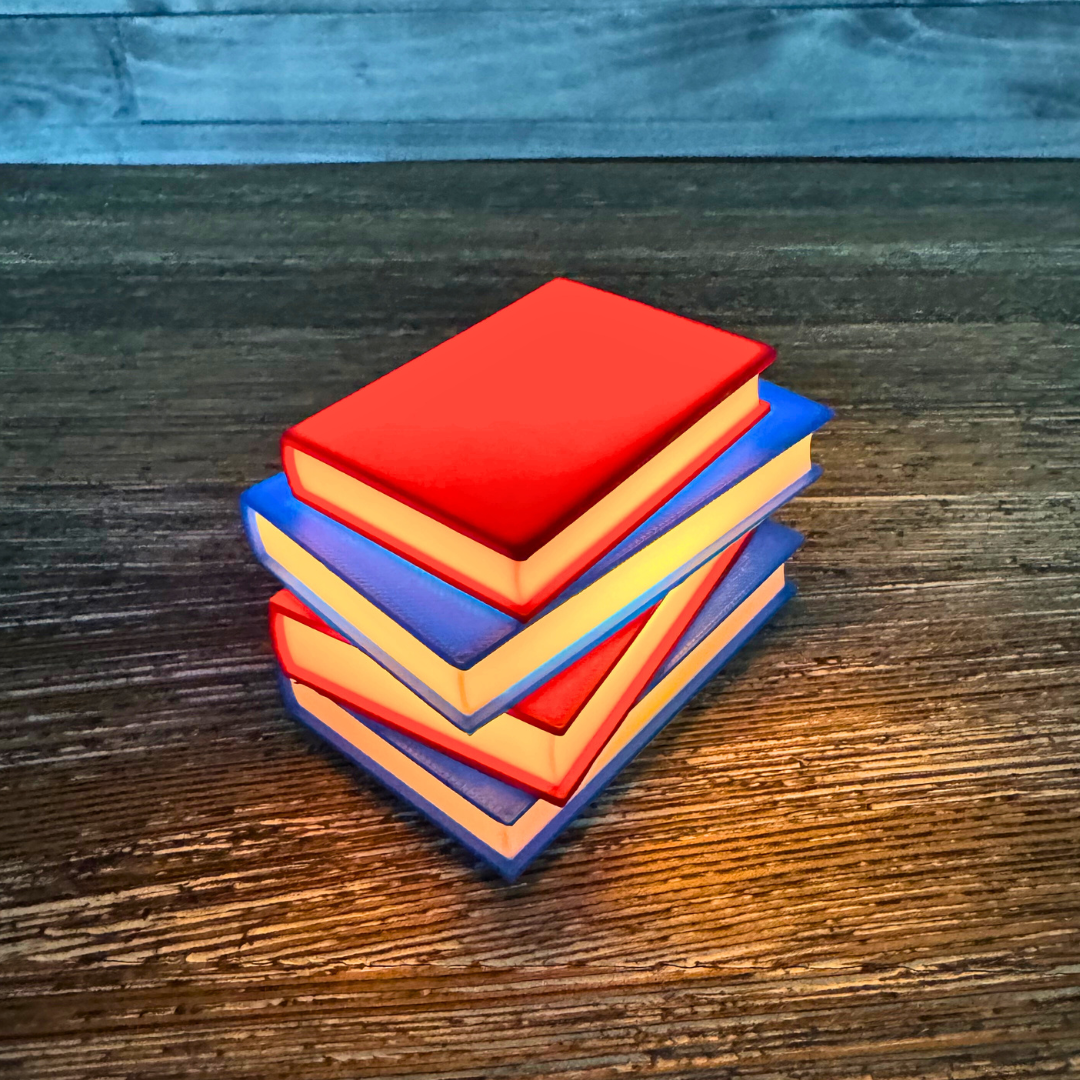 Vibrant red and blue light up stack of books sitting on a wooden bookshelf.